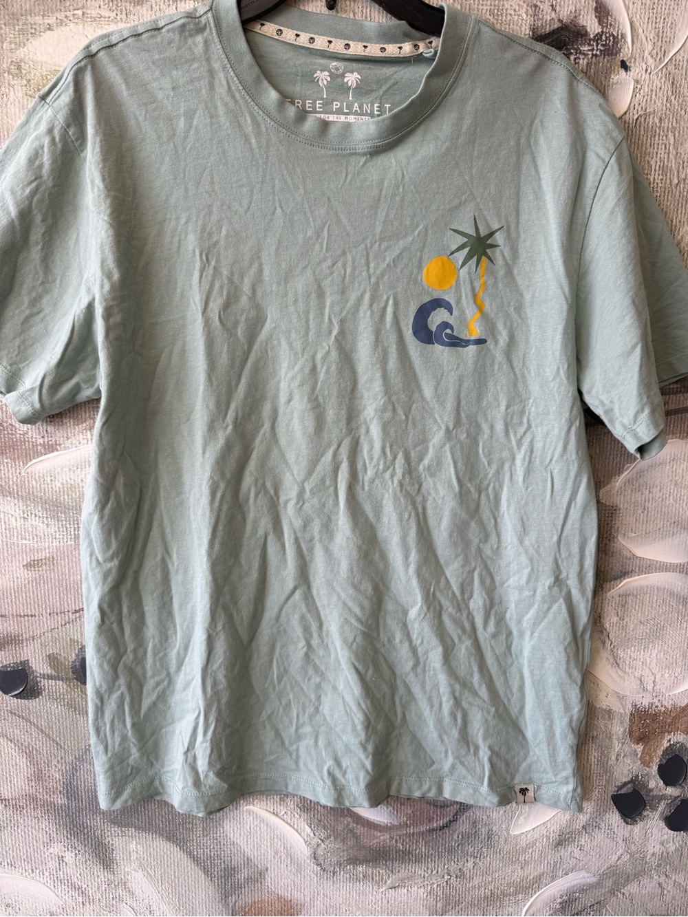 Free Planet Seafoam Green Short Sleeve Tee with Palm & Wave Graphic